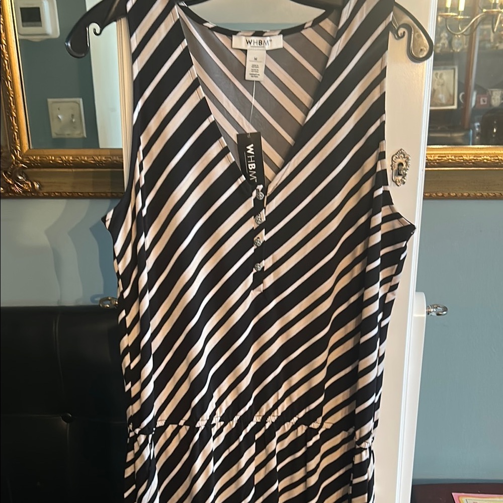 NWT- White House Black Market 
Size Med Black White Striped one-piece Romper
